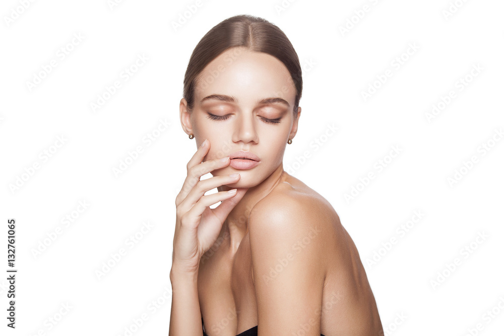 Calm beauty. Portrait of beautiful young blonde woman with nude makeup, blue eyes, hairstyle and clean face. Studio shot, Isolated on white background. Calm beauty. Portrait of beautiful young blonde woman with nude makeup, blue eyes, hairstyle and clean face. Studio shot, Isolated on white background.