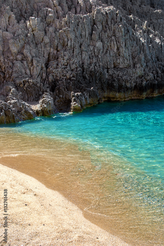 Fantastic bay with blue water, white sand and rocks in the Mediterranean. Greece