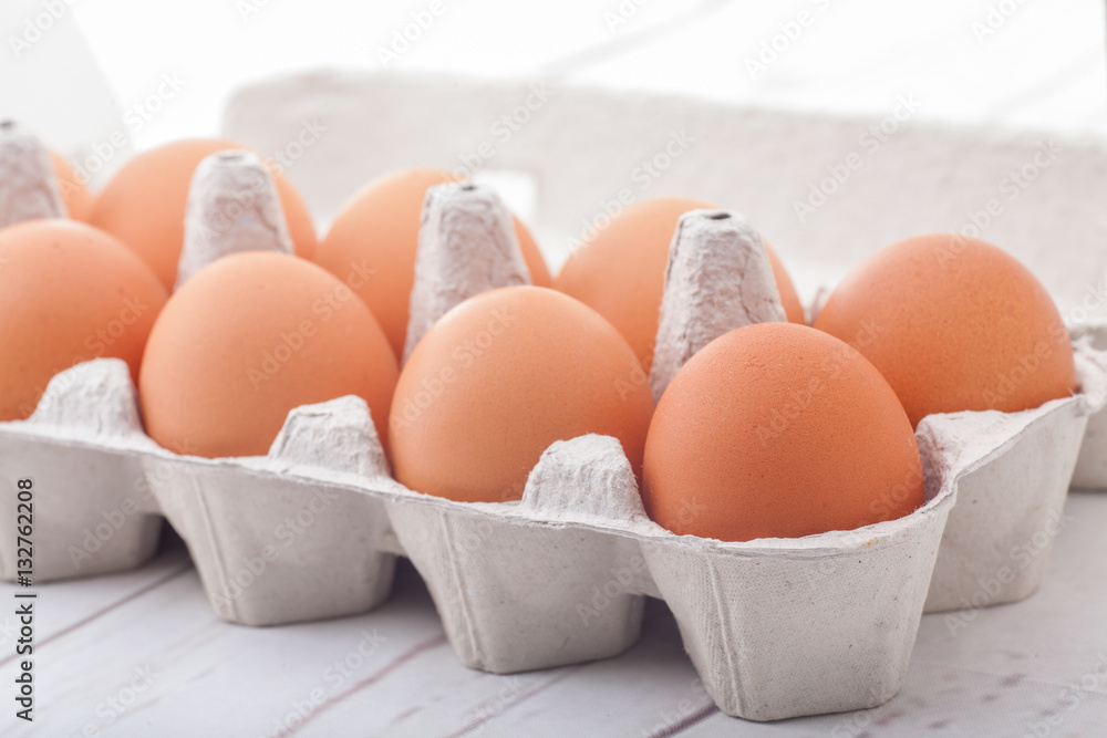 Eggs in paper container Eggs in paper container