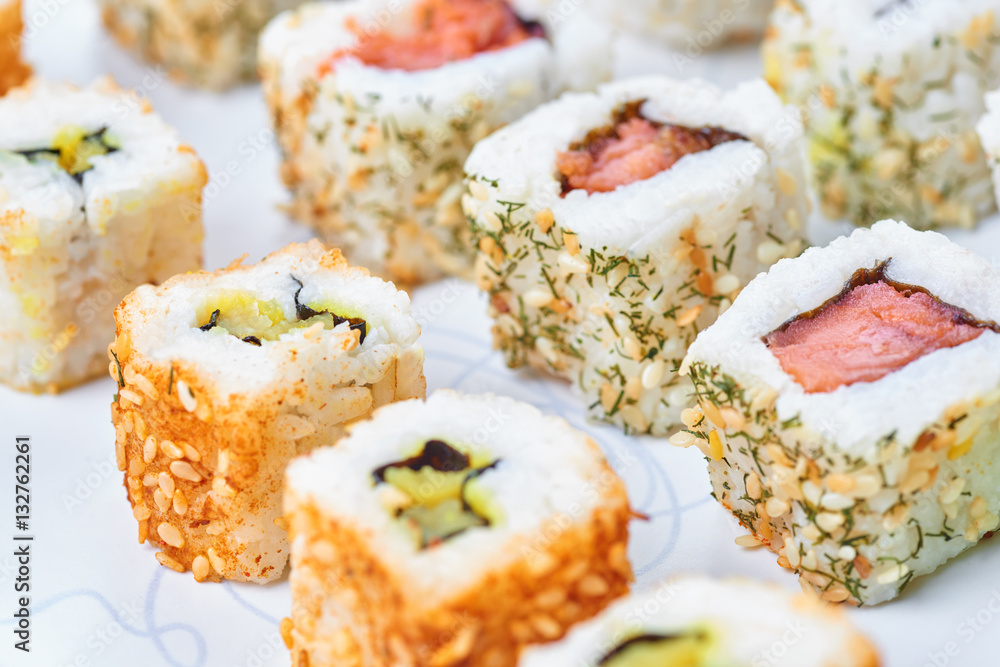Sushi set on a white table