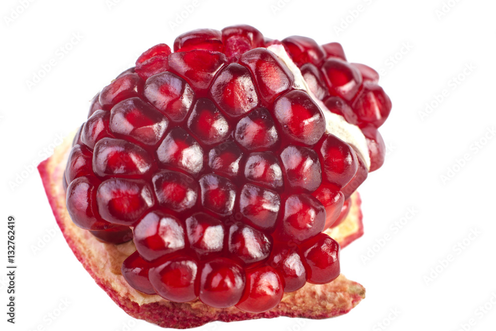 Purified piece of the fruit pomegranate isolated on white background. Red seeds. Purified piece of the fruit pomegranate isolated on white background. Red seeds.