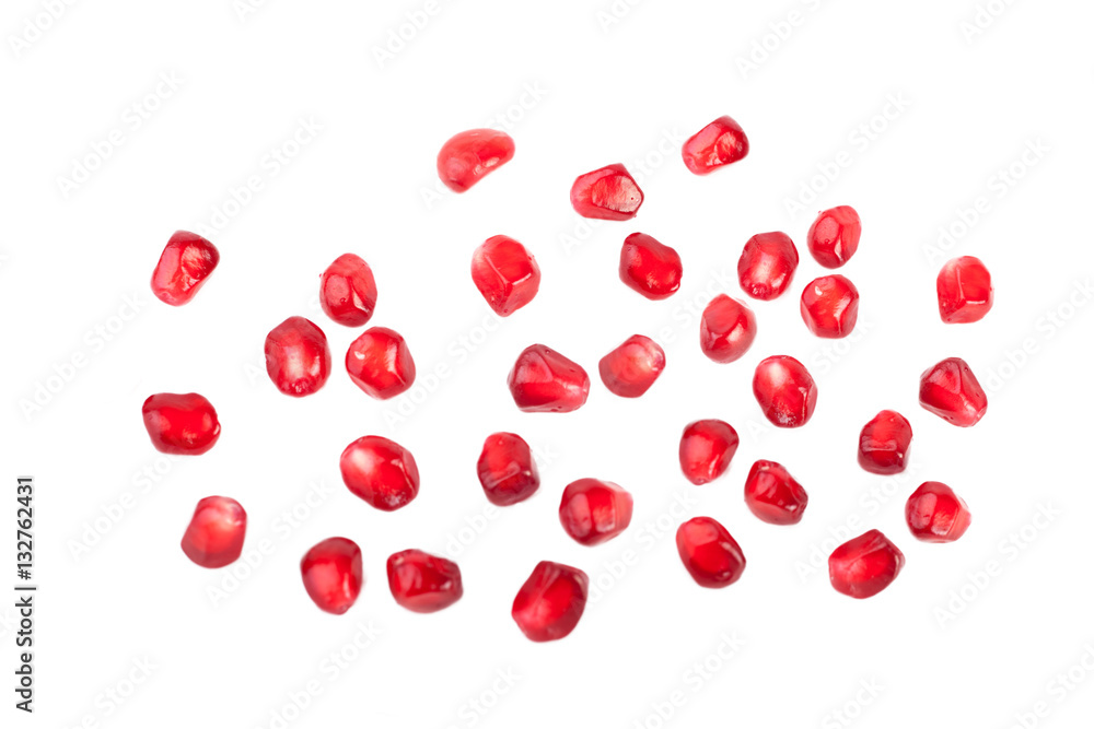 Red seeds of pomegranate isolated on white background.