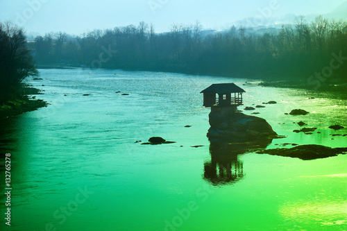 Holiday house on a rock in the river Drina, Serbia photo