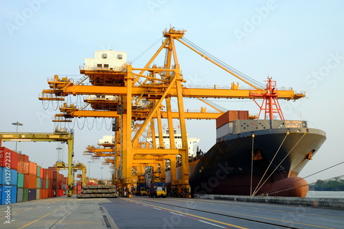 Cargo ships, cranes and containers. For transportation, import and export, Maritime business for import and export of goods. Bangkok, Thailand