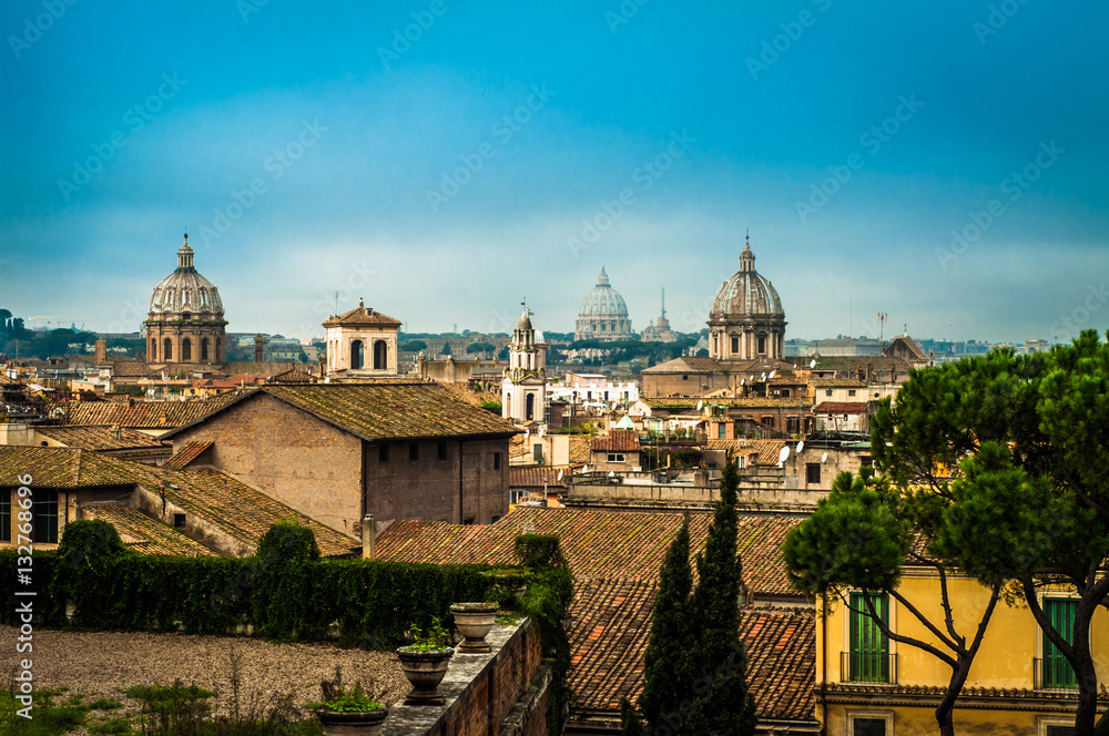 Rooftops of Rome with many cupolae.