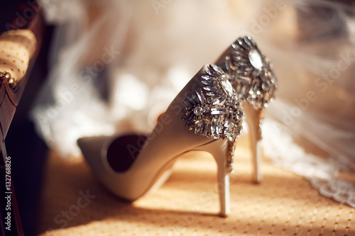 wedding concept. bride's shoes and veil