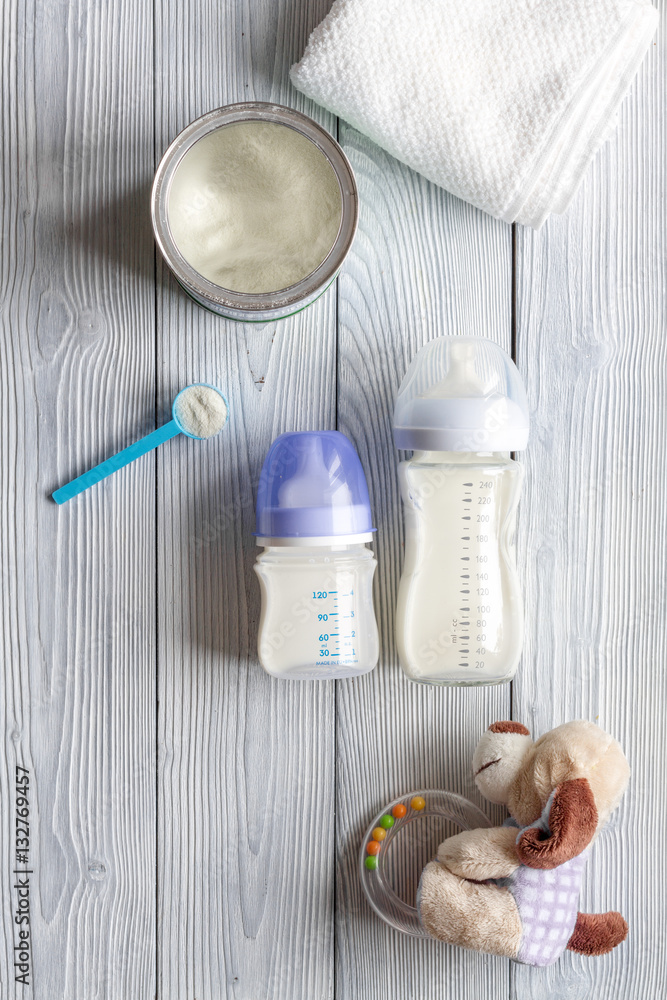 preparation of mixture baby feeding on wooden background top view preparation of mixture baby feeding on wooden background top view