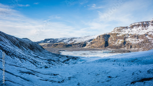 Iceland glacier Myrdalsjokull south coast with volcanic ash and mountains photo