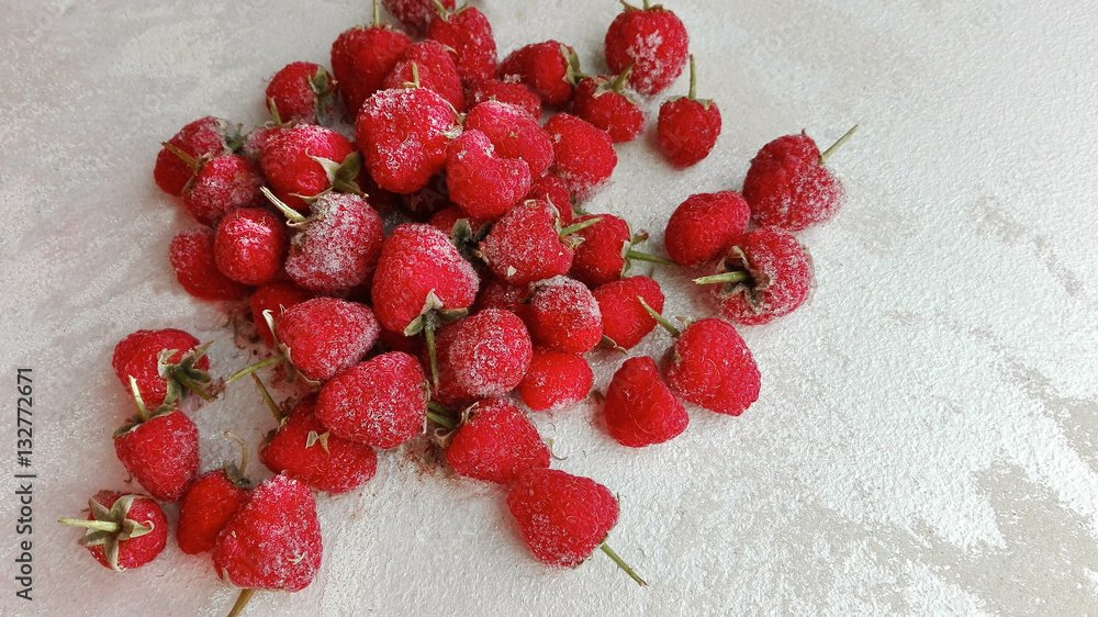 raspberry frozen on cold surface raspberry frozen on cold surface