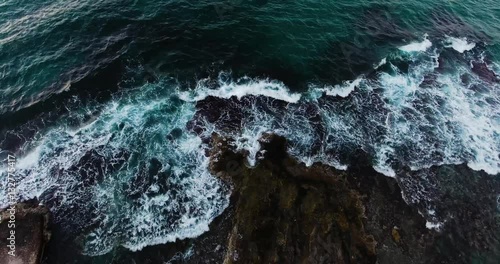 flying above beautiful wavy seashore at evenng
