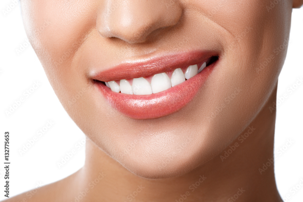 Close up of beautiful wide smile of young fresh woman with great healthy white teeth. Isolated over white background Close up of beautiful wide smile of young fresh woman with great healthy white teeth. Isolated over white background