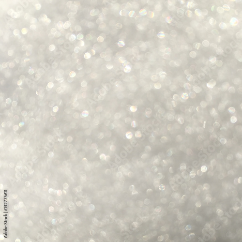 silver glitter bokeh from fresh snow abstract texture background