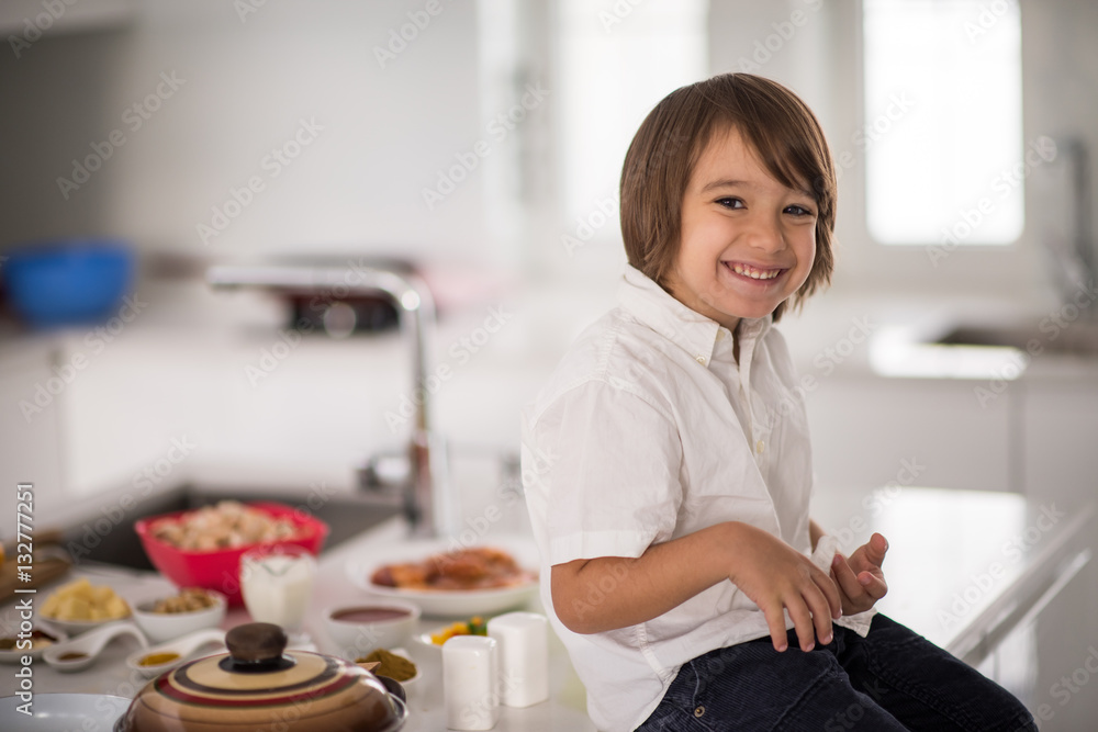 Cute adorable little boy in the kitchen Cute adorable little boy in the kitchen
