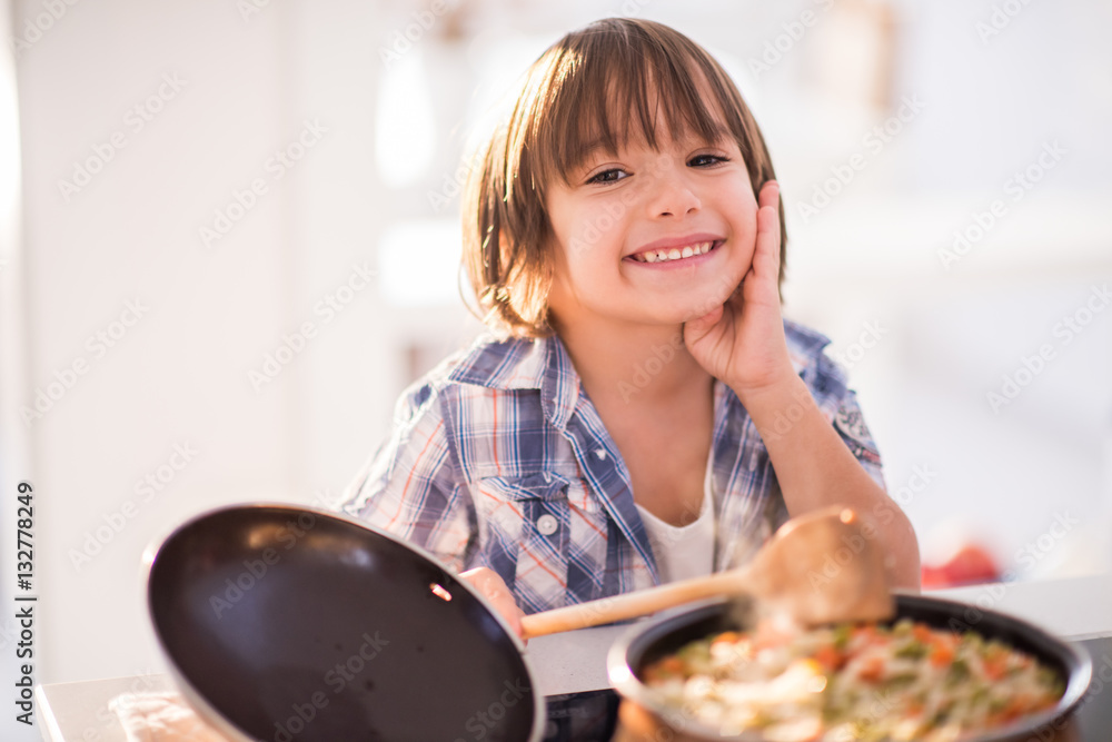Cute adorable little boy in the kitchen Cute adorable little boy in the kitchen