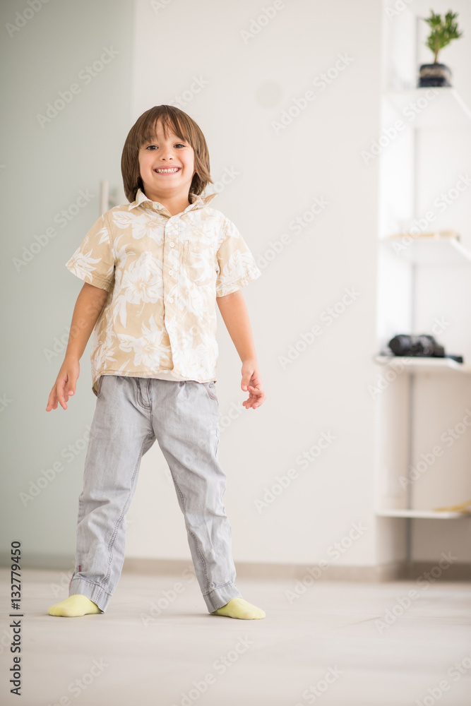 Happy children having fun and posing in new modern home Happy children having fun and posing in new modern home