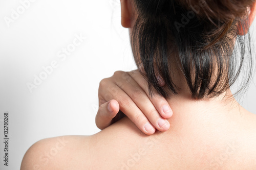 Young woman with pain in her back