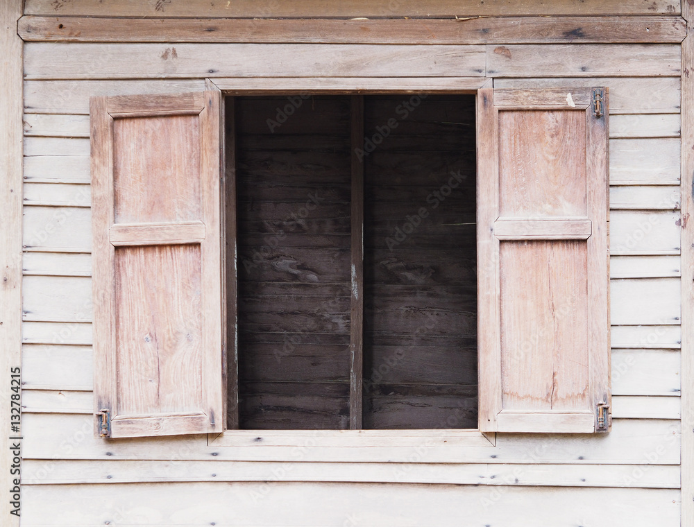 Old wooden wall see through window