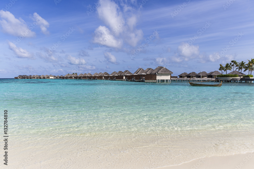 Water villas on the tropical island at maldives