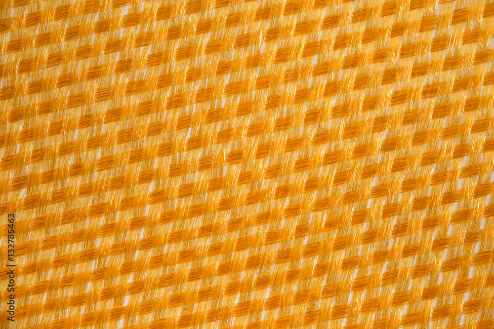 Close up texture of a yellow cloth Close up texture of a yellow cloth