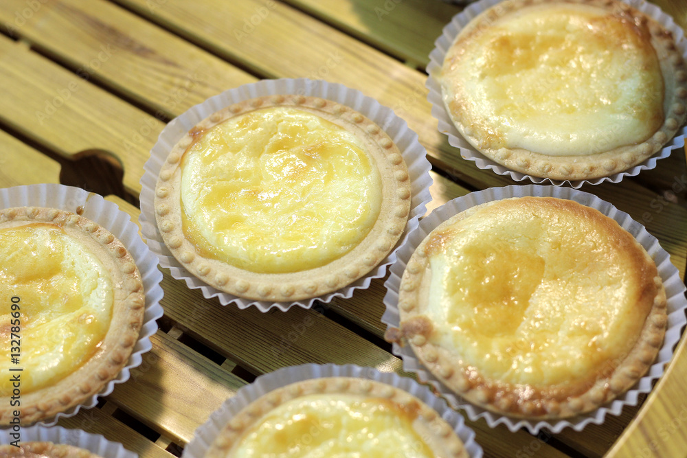Cheese Tart dessert on wooden background. Healthy homemade food. selective focus