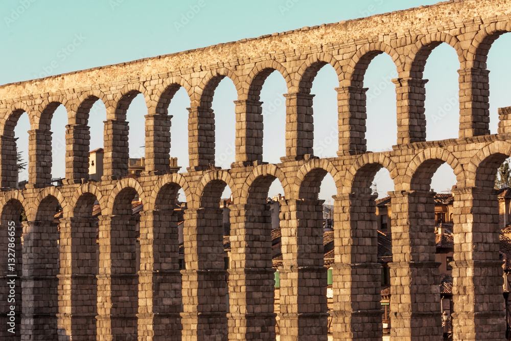 Photo of ancient Roman aqueduct in Segovia, Spain Photo of ancient Roman aqueduct in Segovia, Spain