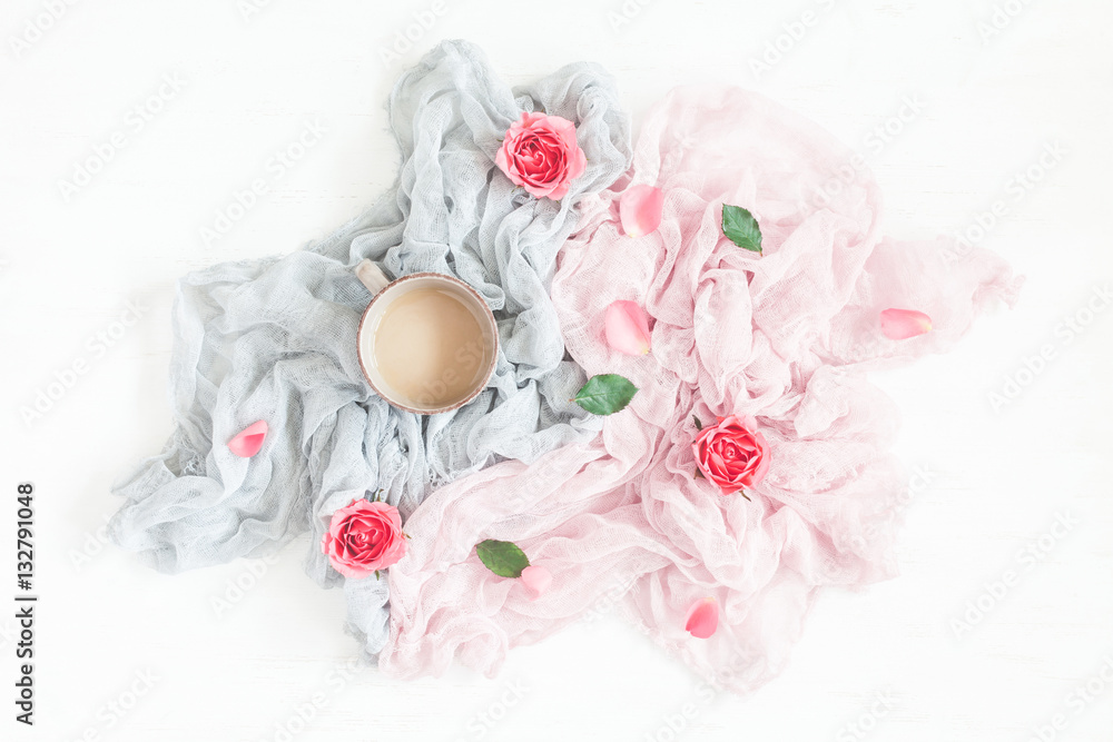 Composition with coffee and rose flowers. Flat lay, top view Composition with coffee and rose flowers. Flat lay, top view