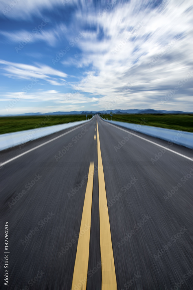 Motion on the empty road and yellow traffic lines. Motion on the empty road and yellow traffic lines.
