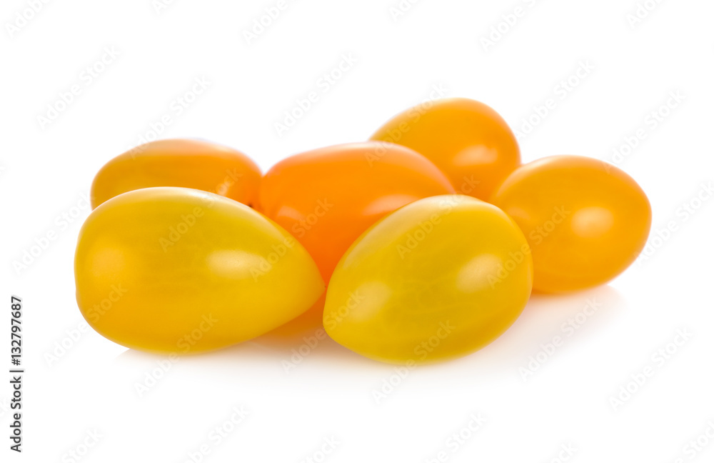 whole yellow cherry tomato on white background whole yellow cherry tomato on white background