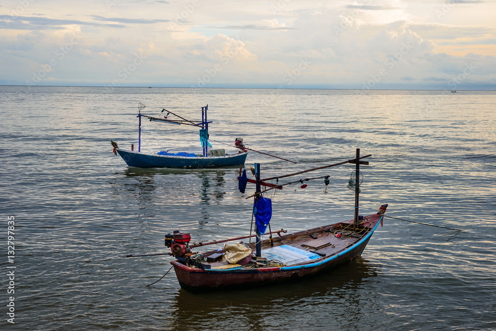 Small fishing boats in the sea Hua Hin , Thailand