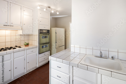 Baby Boomer Kitchen with white tiles