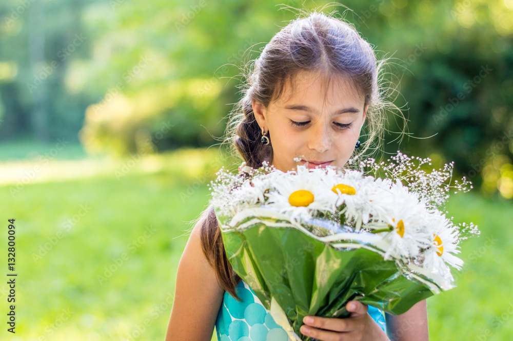 girl with a bouquet of daisies in the Park girl with a bouquet of daisies in the Park