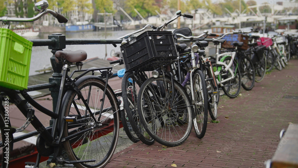 Center of Amsterdam - bicycles parking near amstel canal, the Netherlands