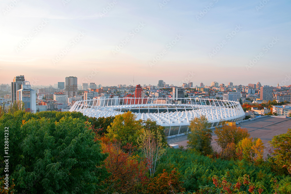 Panoramic cityscape of the centre of Kiev in the sunset: stadium, downtown, skylines, hotel. Ukraine. East Europe Panoramic cityscape of the centre of Kiev in the sunset: stadium, downtown, skylines, hotel. Ukraine. East Europe