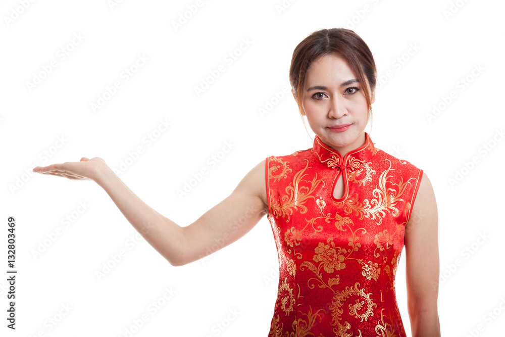 Asian girl in chinese cheongsam dress present blank space with h Asian girl in chinese cheongsam dress present blank space with h