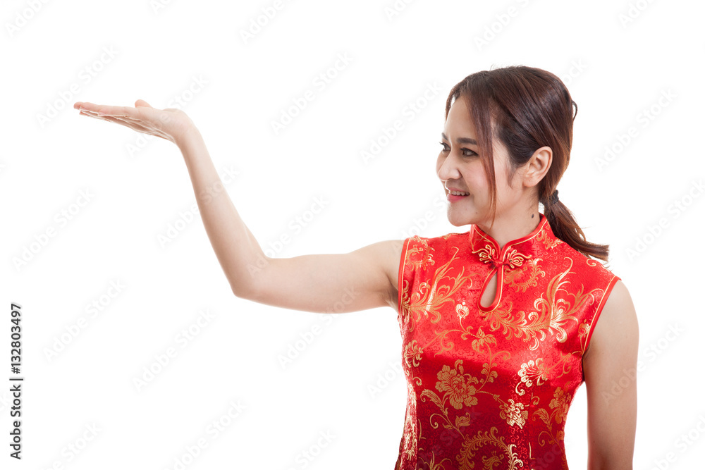 Asian girl in chinese cheongsam dress with blank space on her h Asian girl in chinese cheongsam dress with blank space on her h