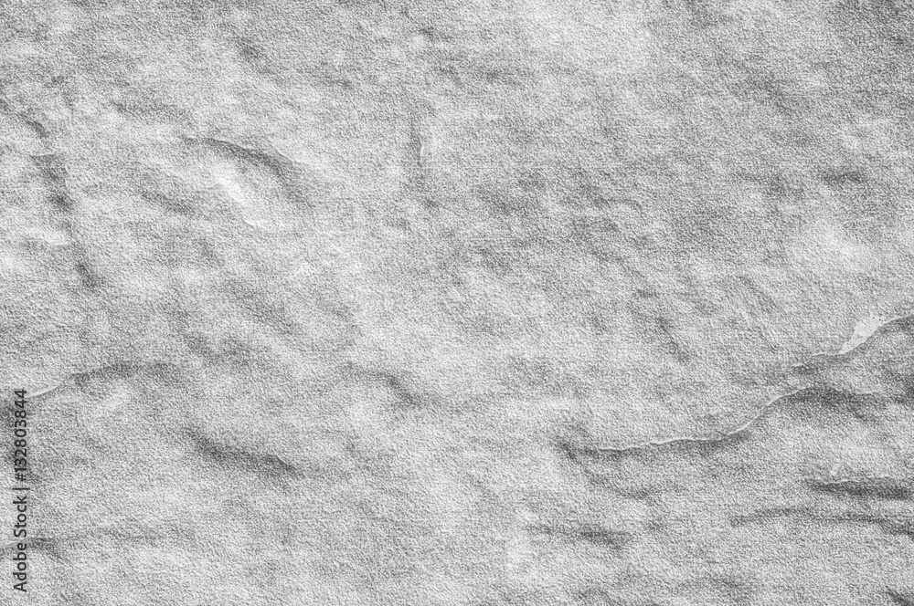 Closeup surface at stone pattern at stone brick wall in the garden textured background in black and white tone Closeup surface at stone pattern at stone brick wall in the garden textured background in black and white tone