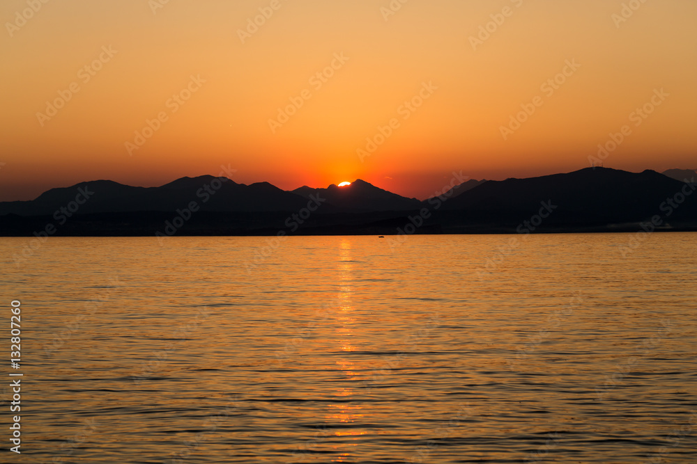 Beautiful sunset at Garda lake in Italy Beautiful sunset at Garda lake in Italy