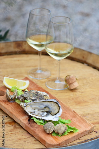 Open Oysters with sauce and champagne
