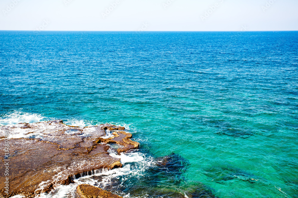 Ocean or sea view with turquoise water and stones