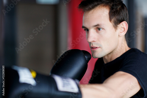 Portrait of training young boxer