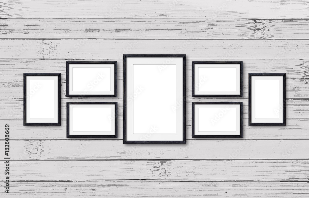 Collage of seven black natural wooden photo frames on old painted panels wall Collage of seven black natural wooden photo frames on old painted panels wall