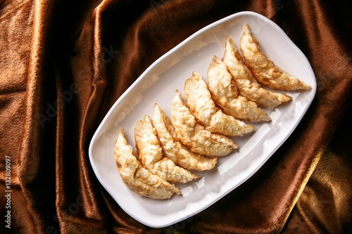 mandu twigim Fried Dumplings on plate photo