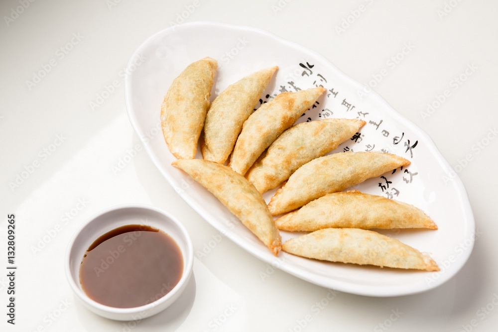 mandu twigim Fried Dumplings on plate mandu twigim Fried Dumplings on plate