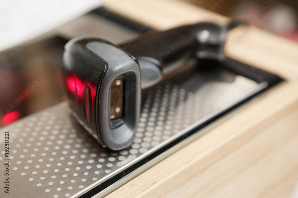 Bar code scanner at checkout in store Bar code scanner at checkout in store