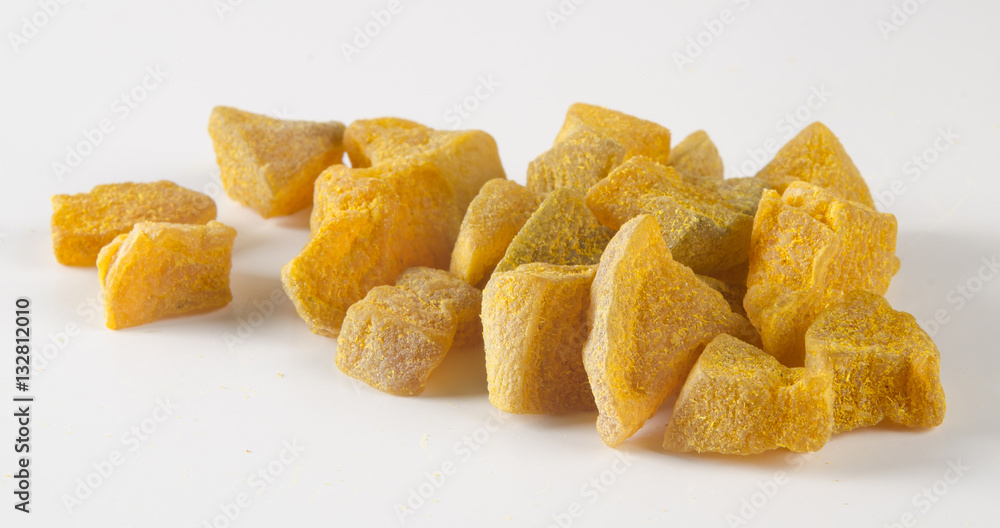 preserved fruits or dry ginger on the background. preserved fruits or dry ginger on the background.