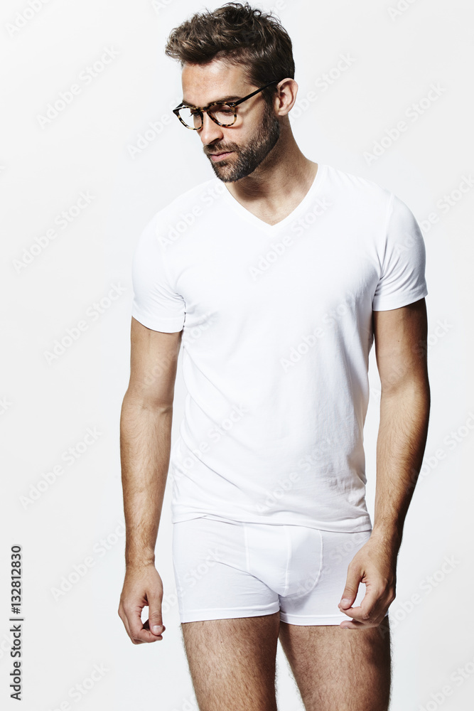 Fototapeta premium Glasses guy in underpants and white t-shirt