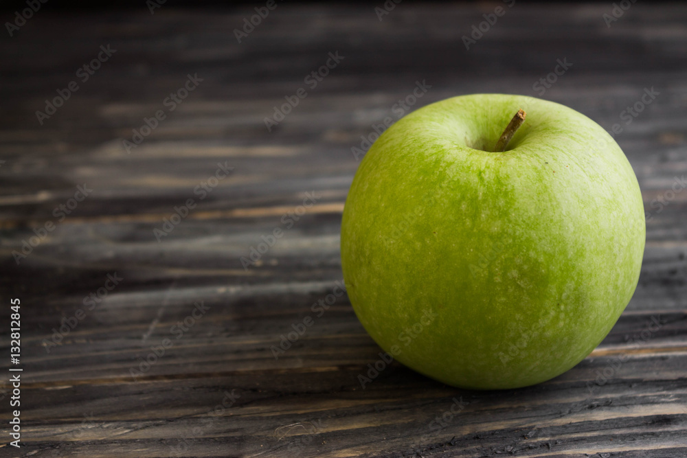 Apples on a wooden background in rustic style Apples on a wooden background in rustic style