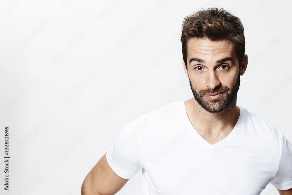 Guy in white t-shirt, smiling Guy in white t-shirt, smiling