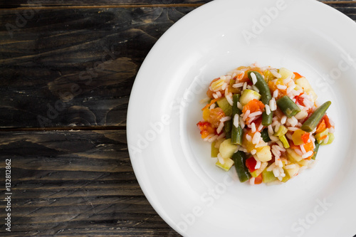 Vegetable salad on a white plate. Dietary dish.