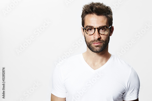 Glasses guy in white t-shirt, portrait © sanneberg